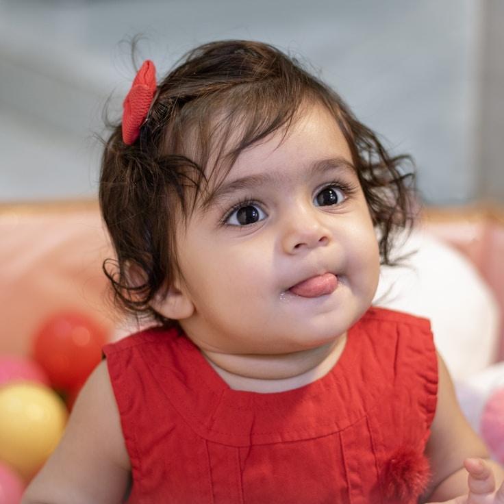 Kaveri Mehta, Lead Design Curator at Anchor Haven Matrix, reviewing corporate floral arrangements